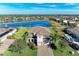 Aerial view of two story house near a lake at 16625 5Th E Ave, Bradenton, FL 34212