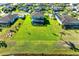 Aerial view of houses with pools and lush green lawns at 16625 5Th E Ave, Bradenton, FL 34212