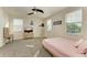 Bright bedroom with a queen bed and plenty of natural light at 16625 5Th E Ave, Bradenton, FL 34212