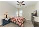 Guest bedroom with ceiling fan and ample closet space at 16625 5Th E Ave, Bradenton, FL 34212