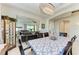 Bright dining room with decorative table setting and view into living room at 16625 5Th E Ave, Bradenton, FL 34212