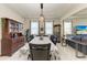 Formal dining room with chandelier and seating for eight at 16625 5Th E Ave, Bradenton, FL 34212