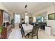 Formal dining room with chandelier, large table and hutch at 16625 5Th E Ave, Bradenton, FL 34212