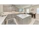 Gourmet kitchen with stainless steel appliances and white quartz countertops at 16625 5Th E Ave, Bradenton, FL 34212