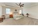 Spacious main bedroom with carpeted floors and ceiling fan at 16625 5Th E Ave, Bradenton, FL 34212