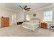 Large main bedroom with carpeted floors and ensuite bathroom at 16625 5Th E Ave, Bradenton, FL 34212