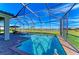 Inviting pool and spa with screened enclosure, perfect for relaxation at 16625 5Th E Ave, Bradenton, FL 34212