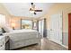 Main bedroom with a queen bed and access to the backyard at 170 Bonita Dr, Rotonda West, FL 33947