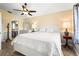 Main bedroom with a queen bed and ensuite bathroom at 170 Bonita Dr, Rotonda West, FL 33947