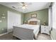 Guest bedroom with white furniture and ceiling fan at 170 Bonita Dr, Rotonda West, FL 33947