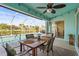 Relaxing pool area with patio furniture and screened enclosure at 170 Bonita Dr, Rotonda West, FL 33947