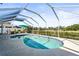 Enjoy this refreshing pool with screened enclosure at 170 Bonita Dr, Rotonda West, FL 33947