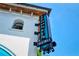 Close up of a vintage sign on the side of a white building with cocktails written on it at 1705 Shoreland Dr, Sarasota, FL 34239