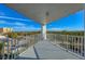 Spacious balcony overlooking scenic landscape and partial water view at 1770 Benjamin Franklin Dr # 407, Sarasota, FL 34236