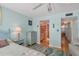 Bedroom with access to a full bathroom and hardwood floors at 1770 Benjamin Franklin Dr # 407, Sarasota, FL 34236