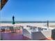 Private patio with beach access and ocean view at 1770 Benjamin Franklin Dr # 407, Sarasota, FL 34236