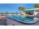 Relaxing heated pool and patio area steps from beach at 1770 Benjamin Franklin Dr # 407, Sarasota, FL 34236