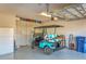 Garage with golf cart and ample storage at 17722 Littleton Pl, Lakewood Ranch, FL 34202