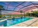 Relaxing pool and spa with screened enclosure, offering sunset views at 17722 Littleton Pl, Lakewood Ranch, FL 34202