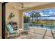 Covered patio with pool and spa views; outdoor grill for entertaining at 17722 Littleton Pl, Lakewood Ranch, FL 34202