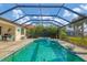 Relax and refresh in this screened-in pool and spa oasis at 17722 Littleton Pl, Lakewood Ranch, FL 34202