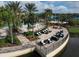 Relaxing resort-style pool with patio seating and fire pit at 17722 Littleton Pl, Lakewood Ranch, FL 34202