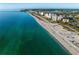 Aerial view of coastline, beach, and buildings at 1778 Palm Dr, Venice, FL 34293