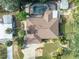 House with pool and fenced backyard, seen from above at 180 Aurora Rd, Venice, FL 34293