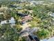 Aerial view showing single-story home, pool, and large lot at 180 Aurora Rd, Venice, FL 34293