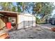 Backyard shed with covered patio area at 180 Aurora Rd, Venice, FL 34293