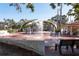 Community water feature with benches and shade structures for relaxing at 180 Aurora Rd, Venice, FL 34293