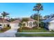 An aerial view showing a house with a large yard and palm trees at 2037 Silver Palm Rd, North Port, FL 34288