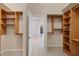 Large walk-in closet with custom shelving and hanging space at 2037 Silver Palm Rd, North Port, FL 34288