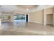 Spacious living area with tile floors, high ceilings, and natural light at 2037 Silver Palm Rd, North Port, FL 34288