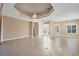 Bright and airy living room with tile flooring and high ceilings at 2037 Silver Palm Rd, North Port, FL 34288