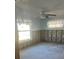 Unfinished bedroom with exposed studs and flooring at 211 84Th St, Holmes Beach, FL 34217