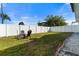 Spacious backyard with fire pit and seating at 2302 15Th W St, Palmetto, FL 34221