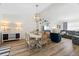 Open concept dining room with chandelier and hardwood floors at 2302 15Th W St, Palmetto, FL 34221