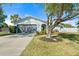 Charming single-story home with gray garage at 2302 15Th W St, Palmetto, FL 34221