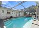 Refreshing pool with a screened enclosure at 2302 15Th W St, Palmetto, FL 34221