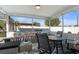 Relaxing screened porch with seating area and outdoor table at 2302 15Th W St, Palmetto, FL 34221