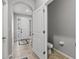 Small half bathroom with toilet and gray walls at 2850 Midnight Pearl Dr, Sarasota, FL 34240