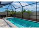 Enclosed pool and patio with grill at 2930 61St E Dr, Ellenton, FL 34222