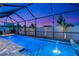 Screened-in pool and patio with fire pit at 2930 61St E Dr, Ellenton, FL 34222