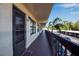 Condo hallway with entrance to unit 210 at 315 30Th W Ave # B210, Bradenton, FL 34205