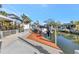 Waterfront property with a private boat dock and lift, perfect for boating enthusiasts at 320 Avenida Leona, Sarasota, FL 34242