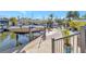 Private boat dock with a boat lift, ready for waterfront living and easy access to the water at 320 Avenida Leona, Sarasota, FL 34242