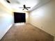 Bedroom featuring natural light, a ceiling fan, and neutral walls at 3409 Branch Creek Dr, Sarasota, FL 34235