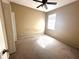 Bedroom with neutral walls, natural light, and a ceiling fan at 3409 Branch Creek Dr, Sarasota, FL 34235