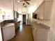 Kitchen featuring white cabinets and appliances at 3409 Branch Creek Dr, Sarasota, FL 34235